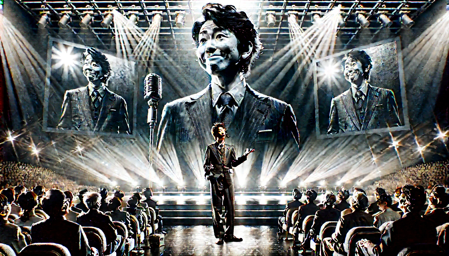 A Japanese comedian, now older and more experienced, performing on a grand stage in modern times. He is in a well-fitted suit, standing confidently under bright spotlights, engaging with a packed audience. The background features large digital screens displaying his comedic expressions. The atmosphere showcases his evolution and continued passion for comedy.